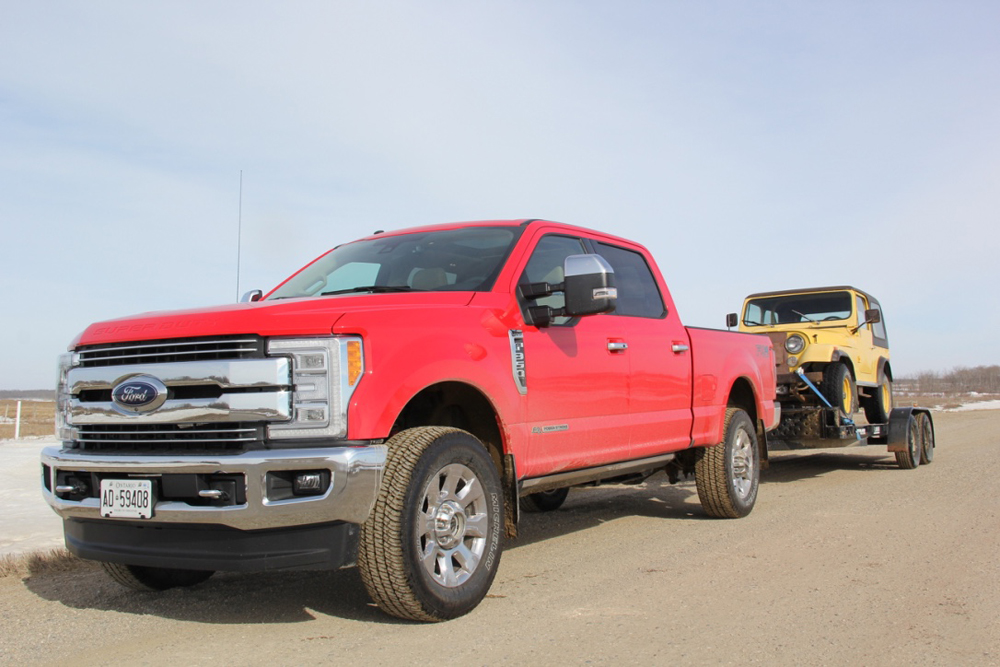 The Powerstroke diesel and six-speed transmission didn’t even seem to notice this trailer 
load behind it, proving the truck is a capable towing rig.