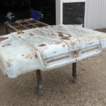 This hood salvaged from a 1960 Ford truck will become the lid for a customized workshop toolbox.