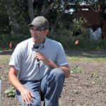 Graham Collier, technical services manager at Nufarm, talks herbicide resistance during a plot tour west of Saskatoon.