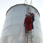Northern Strands debuted its grain bin safety harness at Ag in Motion in July. An anchor system bolts into the ribs on the bin roof. The harness system also includes a lifeline and a wire rope grab.