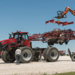 A telehandler can be used to lift bodies on and off the chassis.