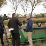 John Longhurst, director of resource and public engagement for the Canadian Foodgrains Bank, speaks to local media at the harvest event on October 3rd. There were 26 growing projects in Saskatchewan alone and over 250 across Canada. Proceeds from those projects will go to the Canadian Foodgrains Bank.
