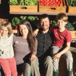 Vegetable producers Francois Handfield and Veronique Bouchard with their children: Philomène, eight, and Éméric, 10.