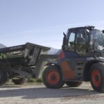 A gooseneck style hitch arrangement transfers some implement or trailer weight to the rear axle.