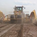 The V-wing design came out of a need to deal with moisture on Jeff Penner’s Manitoba farm. He now produces and sells two models commercially.