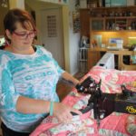 Leeanne Omit also does restoration work on old quilts, like this one that she repaired.