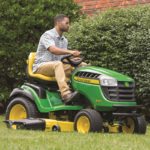 John Deere has upgraded the level of premium features on its 100 Series of lawn tractors for 2018.