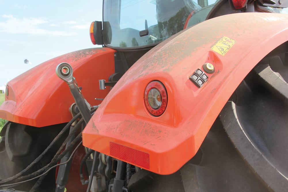 Exterior PTO, three-point hitch and hydraulic controls are available on the  rear fenders.