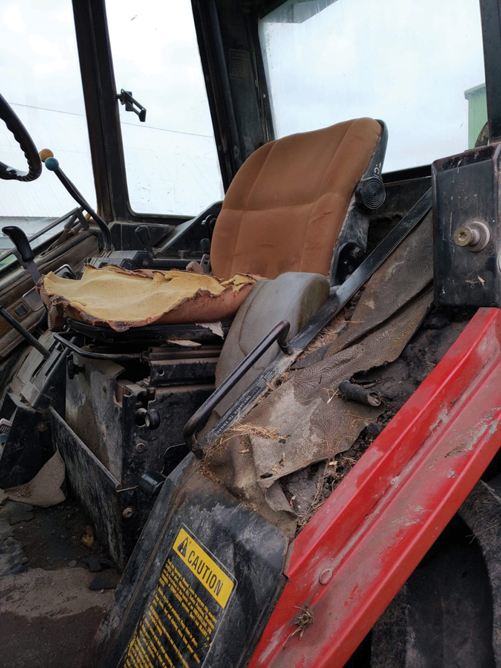 New upholstery was purchased from a supplier and installed after the cab was repainted and given a layer of sound deadening material.