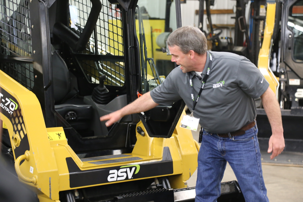 ASV’s Buck Storlie points out the lowered frame at the entrance to the VT-70 High Output, which makes entry and exit a little easier. This improved design will eventually be incorporated into all of the models ASV builds.