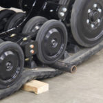 With the unique suspension design built into the track modules, An ASV track system can clear debris, such as this piece of pipe to simulate a rock or other obstruction, that might get trapped in it and go under the bogie wheels or between the track belt and the drive gear, without damage. The tracks don’t use steel cords, therefore they have some stretch to them, which will allow an obstruction to pass through without causing damage. This also helps prevent track derailment.