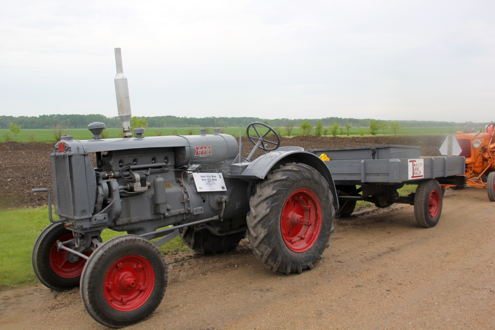 This Minneapolis Moline Twin City tractor pulled a trailer along the route, but on closer inspection, there was something very unusual about the hook up between them. A shaft ran from the tractor’s PTO to an old truck axle under the trailer. 

The owner explained that they really wanted to put the old MM into the trek, but with a top speed of around five miles per hour, it would have been impossible to keep up. So the owners came up with a clever solution. A shaft from the PTO linked to the truck axle under the trailer, which let the trailer push the tractor. The gear ratio that created allowed the tractor to make over 12 m.p.h.