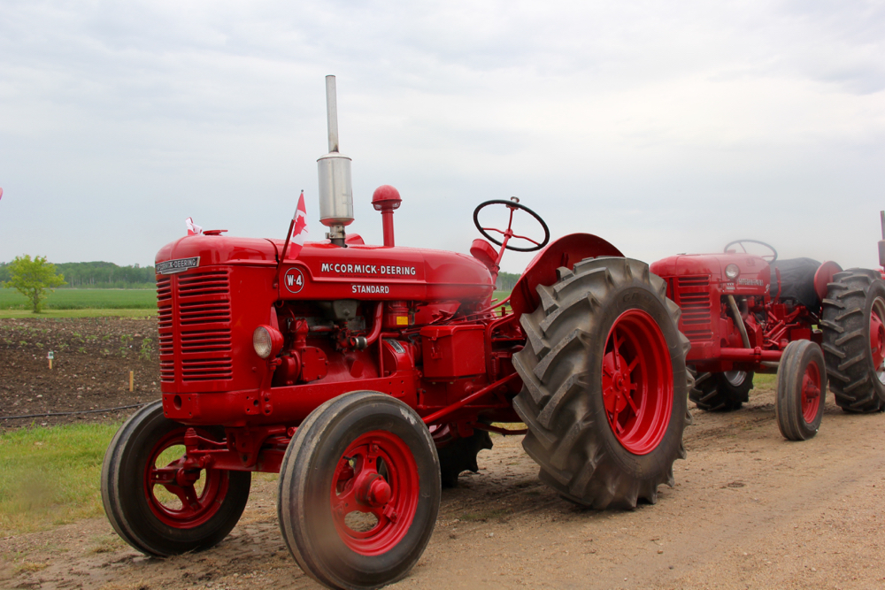 There were several W Series tractors from International Harvester in the Trek. That long-lived model line included the W4, W6, and W9 models, as well as their diesel-powered versions that were identified as WD. This W4 still has the McCormick – Deering name on the side. Those two brands merged to form International Harvester.