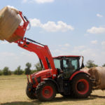 The M77 loader is the factory-installed match for M8 tractors. It offers a shock-dampening feature, with accumulators that absorb shocks from rough terrain to carry the load smoothly. That keeps the shocks felt by the operator to a minimum.