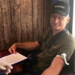 Scott was happy to have an air-conditioned place to sit down for a few minutes during the busy Ag in Motion show. Taking the actual blood sample took almost no time at all.