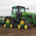 John Deere debuts the industry’s first line of rigid-frame four-track tractors.