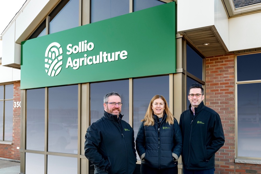 Martyn Donnelly, regional manager, livestock production, Atlantic Canada; Judy Cairns, accounting manager, finance; and David Ross, sales manager, livestock production (l-r) mark the rebranding of their division as Sollio Agriculture outside their Moncton office. (Photo courtesy Sollio Agriculture)
