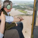 Premier Stephen Harper and Manitoba Premier Greg Selinger examine flooded areas around Brandon in July 2014. (PMO photo by Jill Thompson)