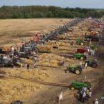 An aerial photo shows 25 to 30 of the antique threshing machines at the July 31 Harvesting Hope world record attempt at the Manitoba Agricultural Museum. (Shaylyn McMahon photo courtesy Harvesting Hope)