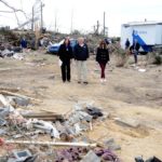 U.S. President Donald Trump and First Lady Melania Trump survey damage and are briefed by a FEMA official on March 8, 2019 in Beauregard, Alabama, where 23 people in Lee County were killed by tornadoes earlier in the week. (Photo: Reuters/Mike Theiler)
