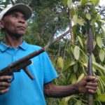 Vanilla farmer Jao Nasaina holds a spear and a handmade gun as he patrols at his plantation, to guard the crop against thieves, in Ambavala, near Andapa in the Sava region of Madagascar on July 14, 2018. (Photo: Reuters/Clarel Faniry Rasoanaivo)
