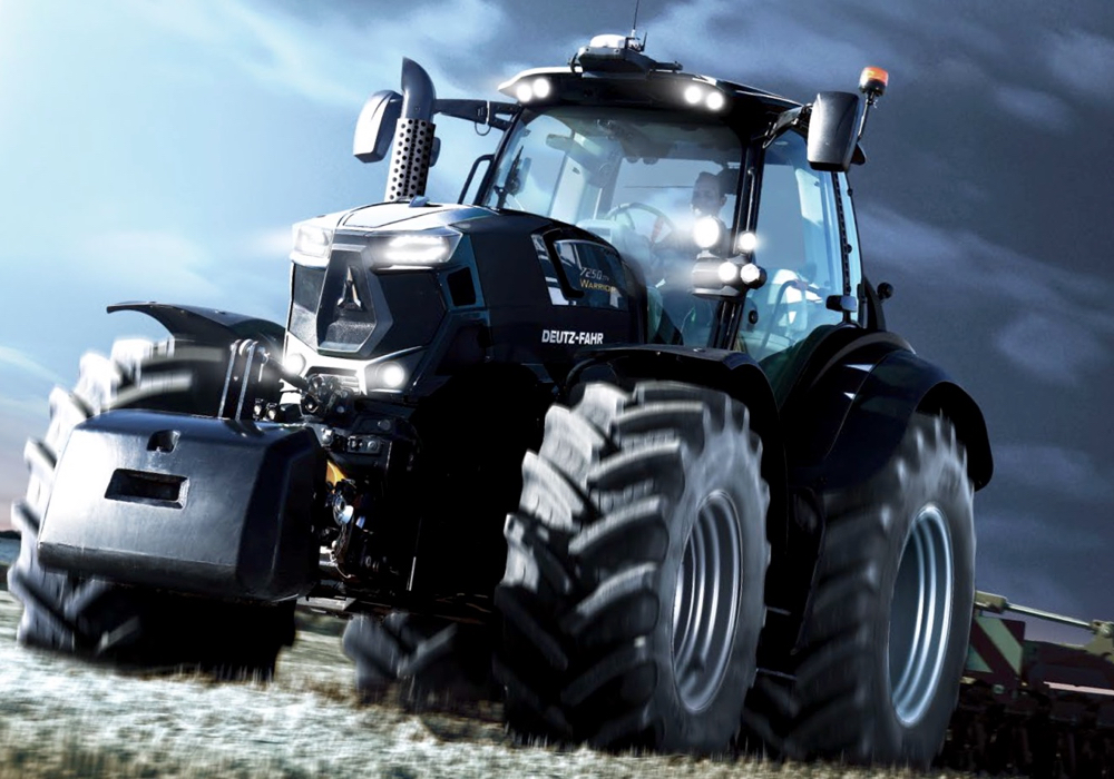 Occupying the flagship spot in Deutz Fahr’s North American line is the 9340 TTV Warrior tractor with 316 horsepower under the hood. The “Warrior” model, which is also available as a 7250 TTV, is the brand’s premium, “limited edition” tractor. The maximum power rating on the 9340 offers another 20 horsepower, bringing the tractor up to 336 horsepower when needed. The 7250 is rated at 230, but jumps to 246 with its maximum horsepower rating.
The Warriors mate their Deutz-Fahr-built diesel engines — a 6.1 litre in the 7250 and a 7.8 litre version in the 9340 — to the brand’s TTV continuously variable transmissions, which offer both “Auto” and “Manual” driving functions. The TTV can creep the tractors along as slow as 0.2 km/h. or move them down the road at up to 60 km/h. at reduced engine RPMs.
The Warriors can be made to stand out from their brothers in the Deutz-Fahr tractor lines with a unique black paint scheme, or they can also be ordered in standard Deutz-Fahr green.
At e rear the 9340 has a three-point hitch lift capacity of 12,000 kilogram and an optional hydraulic output hits 210 l/min. 160l/min. is standard. The 7250 gets a rear lift rating of 10,000 kilograms and a hydraulic pump that can push out 120 l/min. That can jump up to 160 as an option. Both models use a load-sensing pump.
Like the other tractors, inside the cab Warriors use the brand’s 12-inch iMonitor 2.0 to handle tractor data and precision farming functions. The iMonitor is capable of handling ISOBUS-compatible implement functions. It can also handle input from up to two remote cameras.
The 9 Series TTV Agrotron line includes three models that offer 277 to 316 horsepower with 40, 50 and 60 km/h. transmission options. In the 7 Series, there are two standard models, the 7230 and 7250 that offer engine horsepower ratings of 214 and 230.
Deutz-Fahr offers tractors equipped with adaptive front suspension that includes front dry-disc brakes on tractors. A booster system allows for maximum brake pressure with only light pedal application.