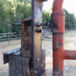 Some scrap steel pieces around the yard were welded together to create a sturdy extension for a gate post.