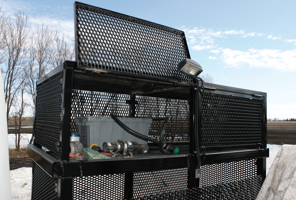 Work lights are revealed when the doors are flipped open on the storage area.