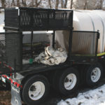 The side doors can swing wide open to make loading of chemical totes easier. 