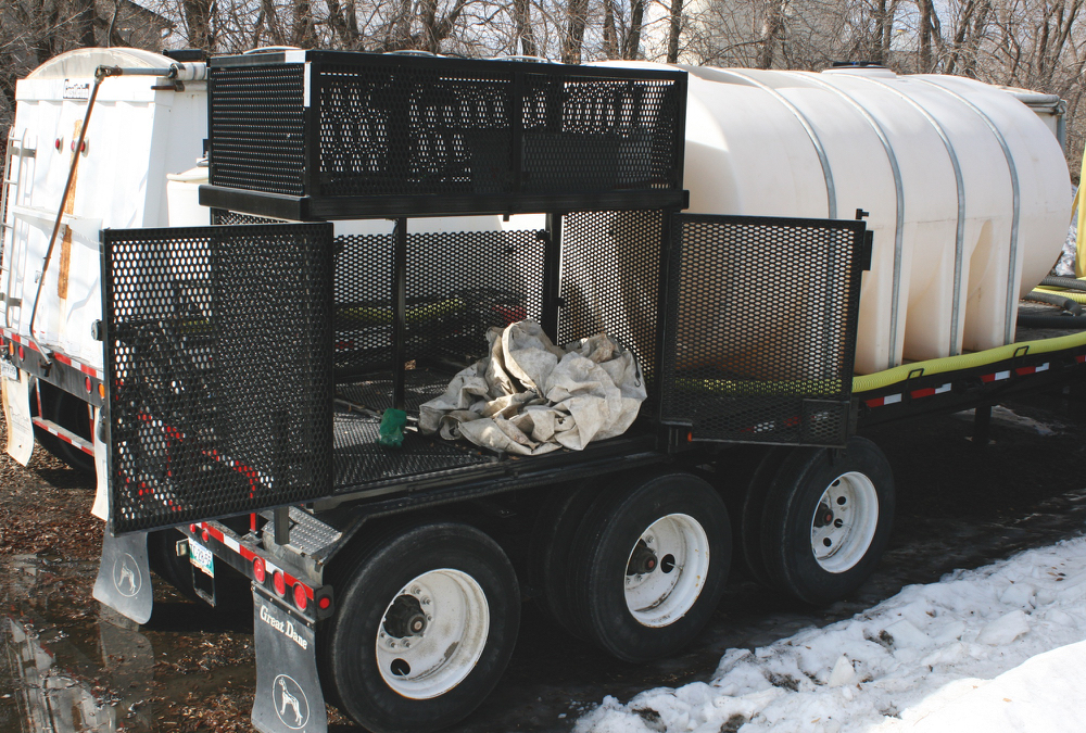 The side doors can swing wide open to make loading of chemical totes easier. 