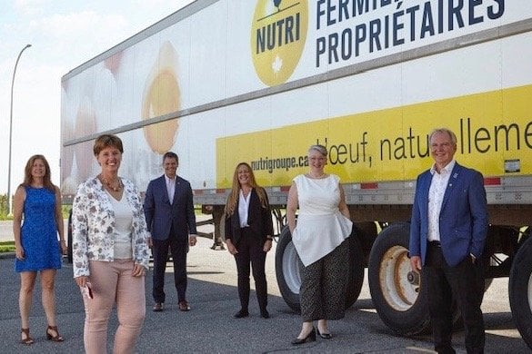 Officials at the Aug. 13, 2020 rollout of the federal surplus food program included (l-r) Julie Marchand of Food Banks of Quebec, Agriculture Minister Marie-Claude Bibeau, Claude Dulude of Nutri Group, Marie-Jose Mastromonaco of Second Harvest, Tania Little of Food Banks Canada and Serge Lefebvre of Nutri Group. (Photo courtesy Agriculture and Agri-Food Canada)
