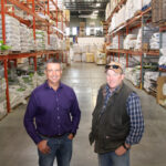 Union Forage general manager Geoff Barker, right and company president Graeme Finn in the southeast Calgary company headquarters and distribution centre.