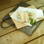 Salad rolls with dip.