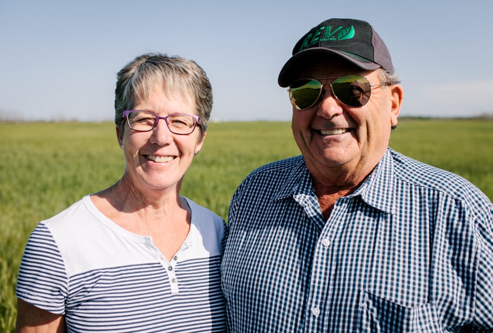 Organic farmer Boyd Charles, pictured here with wife, Gloria, of Stoughton, Sask., says his pelletized and cooked chicken manure packs more fertilizer punch for his grain crops than commercial fertilizer ever could.