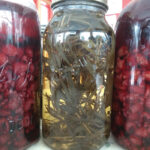 Some of my bottles hold self-infused vinegars — my own fruits, berries and herbs stuffed into jars of cider or wine vinegars.
