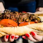 File photo of a steak sandwich with chimichurri sauce at a street food market in Buenos Aires. (Aleksandr_Vorobev/iStock/Getty Images)