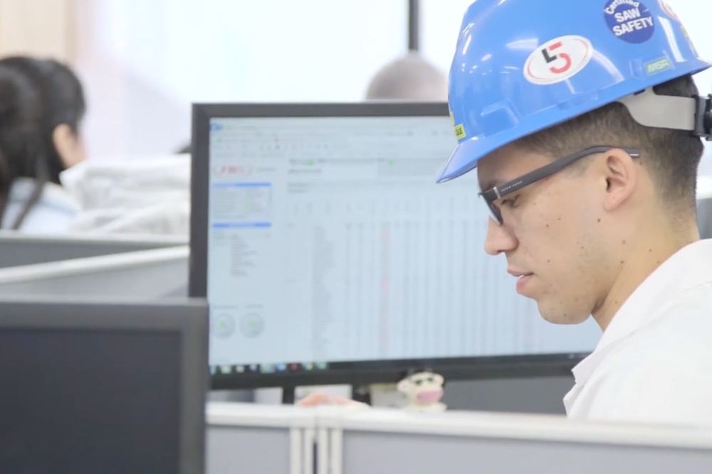 Video screengrab featuring an office at the JBS beef plant at Brooks, Alta. (JBS video via YouTube)