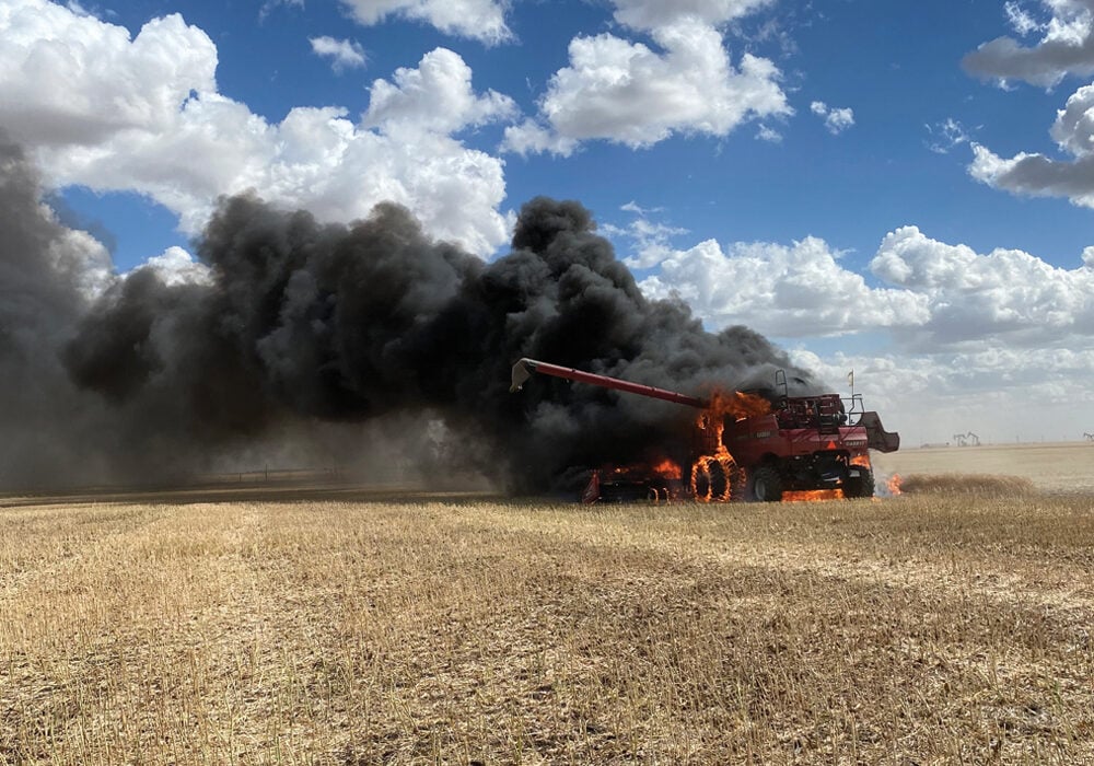 This combine caught fire on the LeBlanc farm near Estevan, Sask., during harvest last September. Gracie LeBlanc, who was harvesting canola at the time, was able to safely exit the cab before it was engulfed in flames.
