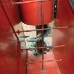 This is a look at the interior of a drill filler. Hardman says the bristles near the bottom of the device help to gently lift seed for soybean and peas without cracking them unlike many regular augers, which can damage seed and prevent it from growing.