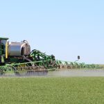 Erebus Xtreme is sprayed on a spring wheat field during a 2021 field trial in Balcarres, Sask.