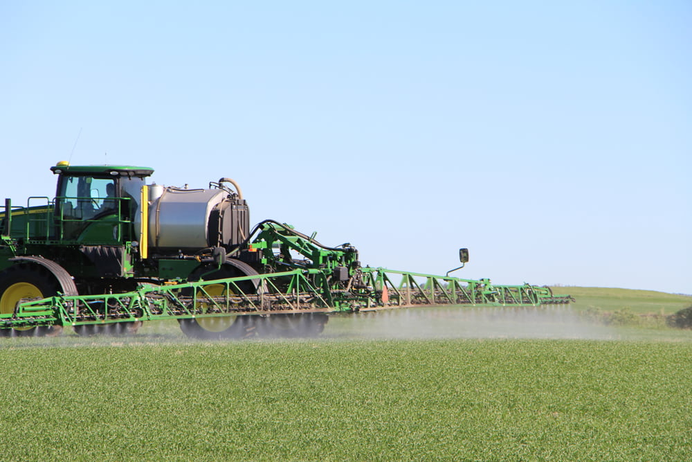 Erebus Xtreme is sprayed on a spring wheat field during a 2021 field trial in Balcarres, Sask.