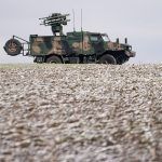 A POPRAD Close Air Defense Vehicle is seen parked in a farm field near the border of Ukraine, in southeast Poland, Feb. 28, 2022.