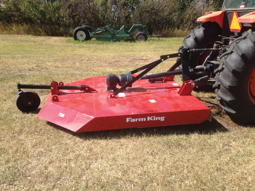 My shiny, new, seven foot, three-point-hitch mower for future grass projects.