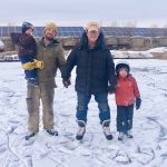 Three generations of the Eppich family take to the ice on a farm pond before the spring thaw arrives.
