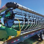 The AWS Airbar mounts on
conventional straight-cut headers
and blows high-pressure air over the
knife to help reduce pod loss and
prevent material buildup that
could impede crop flow.