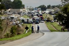 Supporters of Brazil&#8217;s President Jair Bolsonaro block highway BR-060, during a protest against President-elect Luiz Inacio Lula da Silva who won a third term following the presidential election run-off, in Abadiania, Brazil, October 31, 2022.  Photo: Reuters/Ueslei Marcelino
