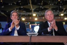 U.S. special presidential envoy for climate John Kerry and Agriculture Sectretary Tom Vilsack applaud U.S. President Joe Biden’s speech at the COP27 climate summit at Sharm el-Sheikh, Egypt on Nov. 11, 2022. (Photo: Reuters/Kevin Lamarque)
