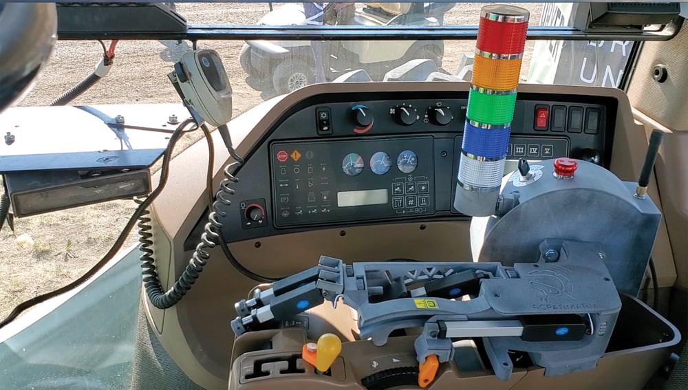 The RC FarmArm allows an operator to manipulate tractor controls from outside of the cab with a remote controller.