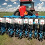 Four years of plot and field research by Farming Smarter to study the use of a precision planter, such as this Monosem planter to seed grains, oilseeds and pulse crops, show overall the planters produce an even crop stand and good yields particularly on 12-inch row spacing.