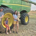 Chad, Britny, Lila, Kate and Ruby with their John Deere S670 combine.